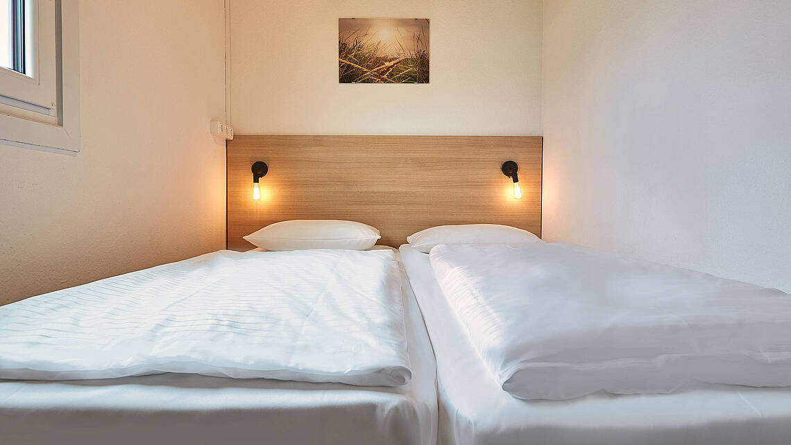 Schlafzimmer im Blockhaus